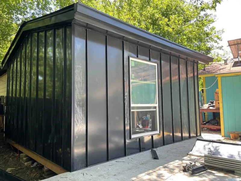 Black standing seam metal wall panels for Roof Inspection in Avon Lake